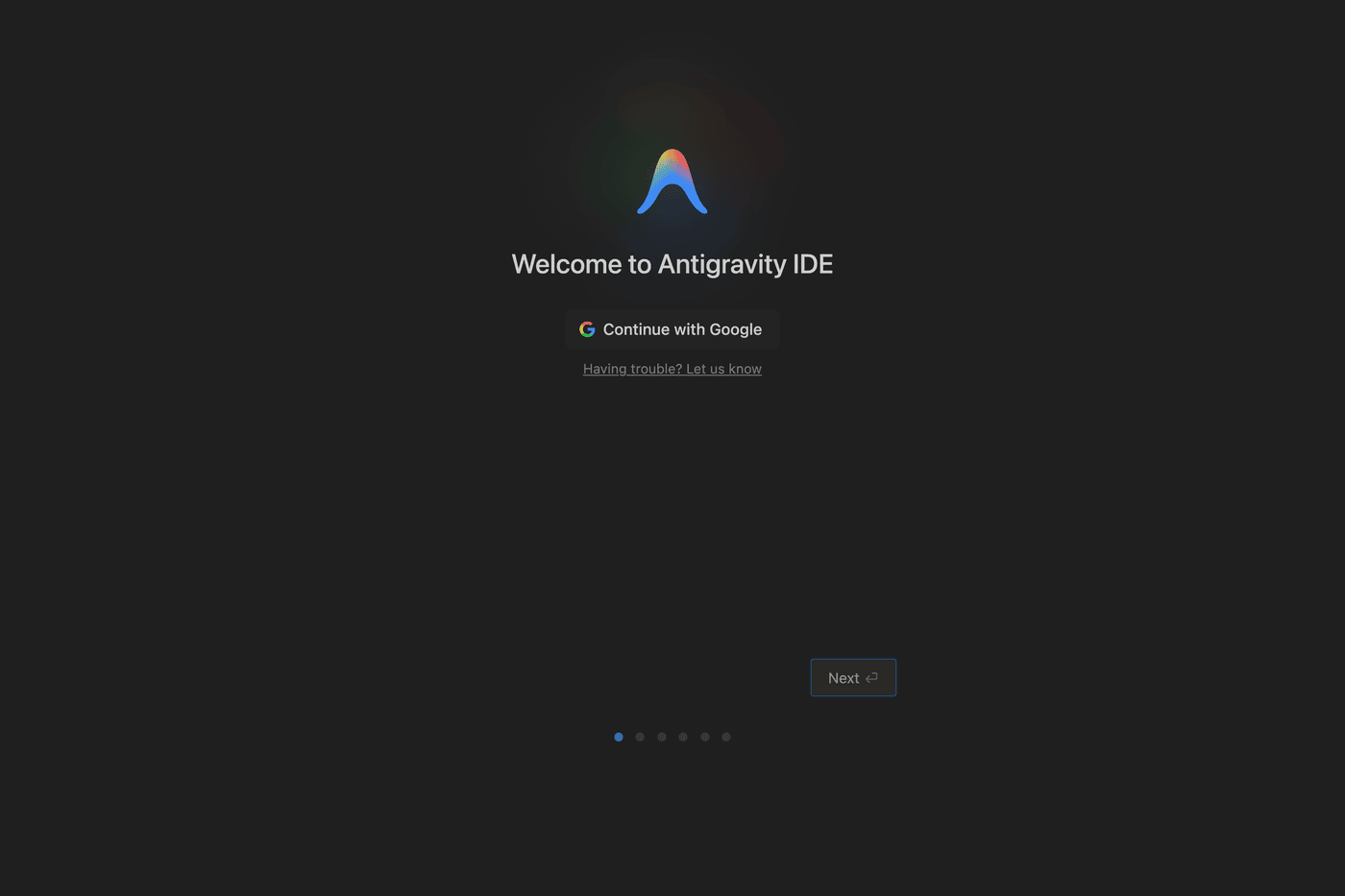 Welcome to Antigravity IDE の画面。Continue with Google のボタンと、下に6つの点